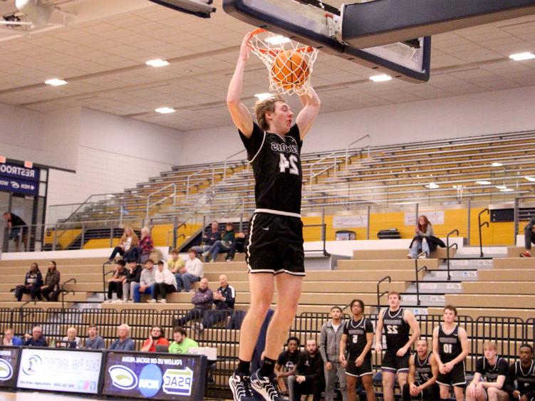 Penn State DuBois senior forward Beau Verdill slams the ball home during a drive in the lane in the second half of the team’s game at Clarion University on Nov. 26.